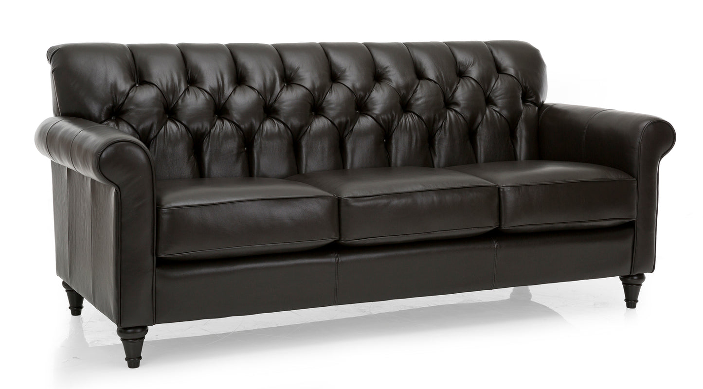 Black leather sofa with tufted backrest on a white background