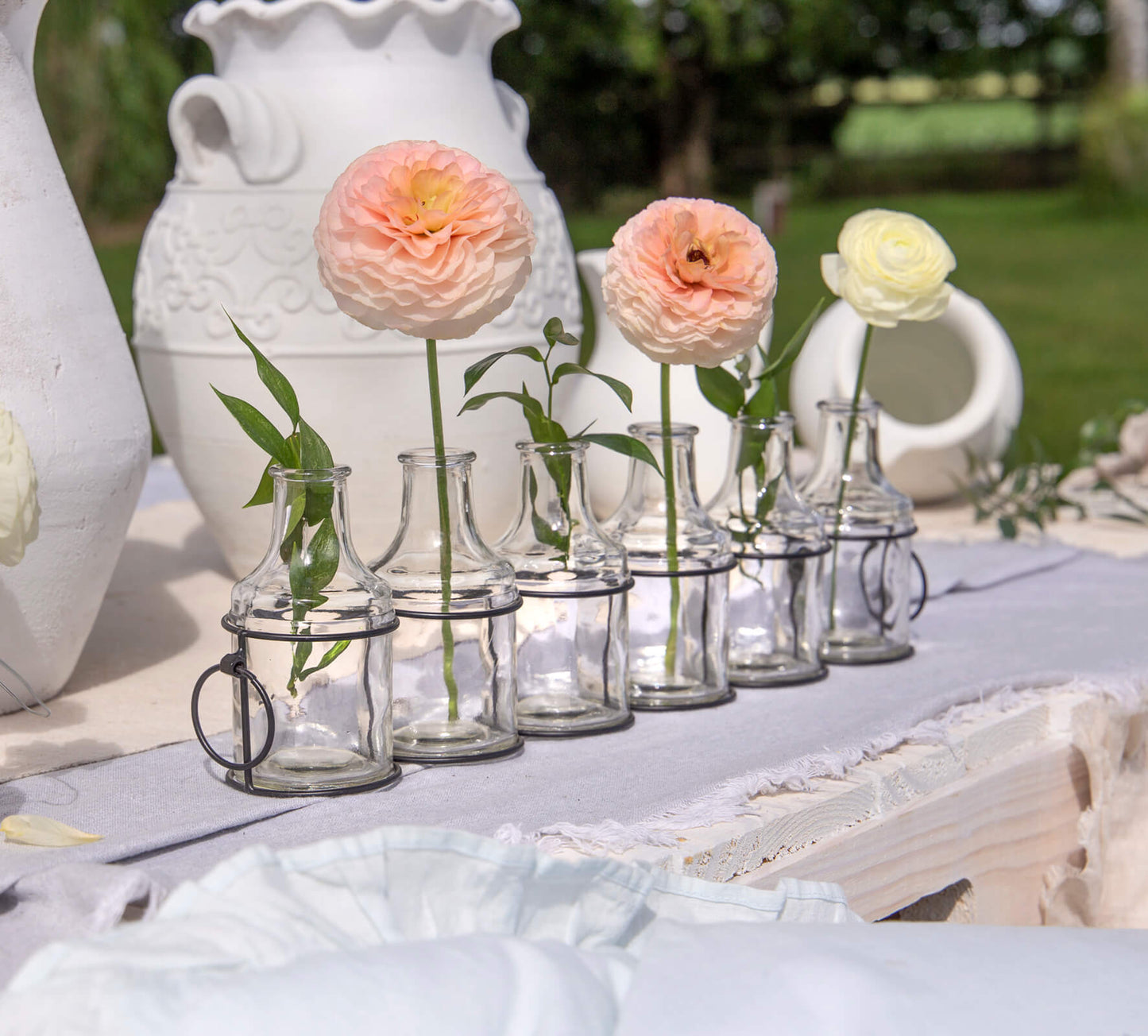 Six Glass Vases in Metal Container
