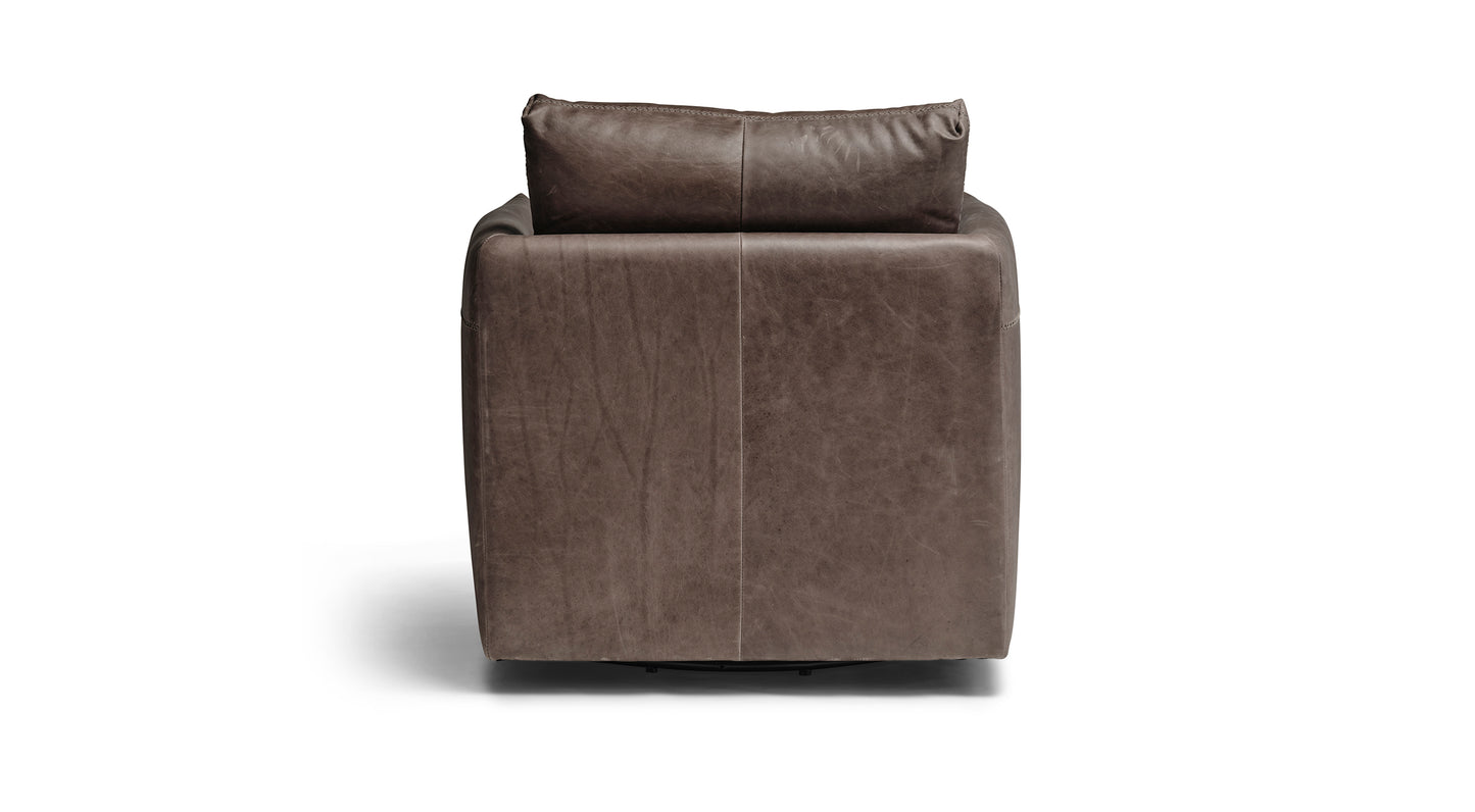 Brown leather armchair on a white background