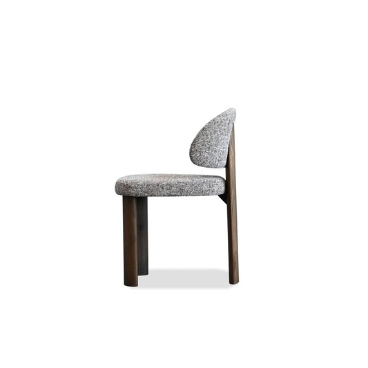 Modern chair with a wooden base and gray cushioned seat on a white background