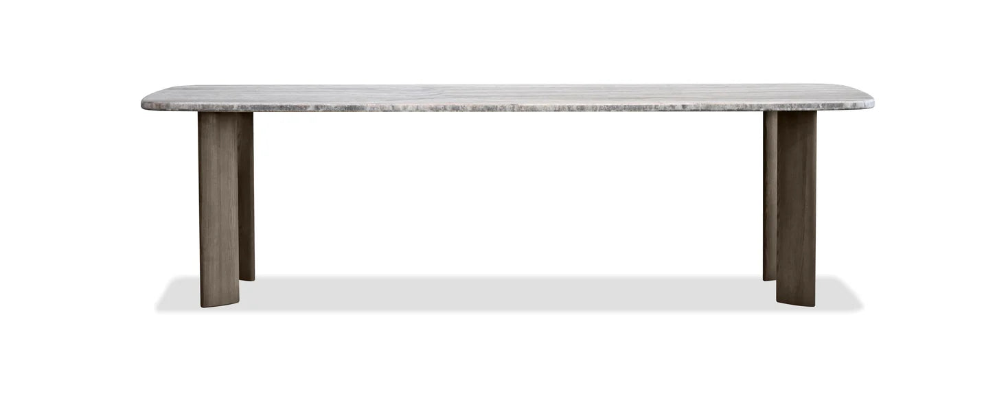 Dining table with marble top and wooden legs on a white background