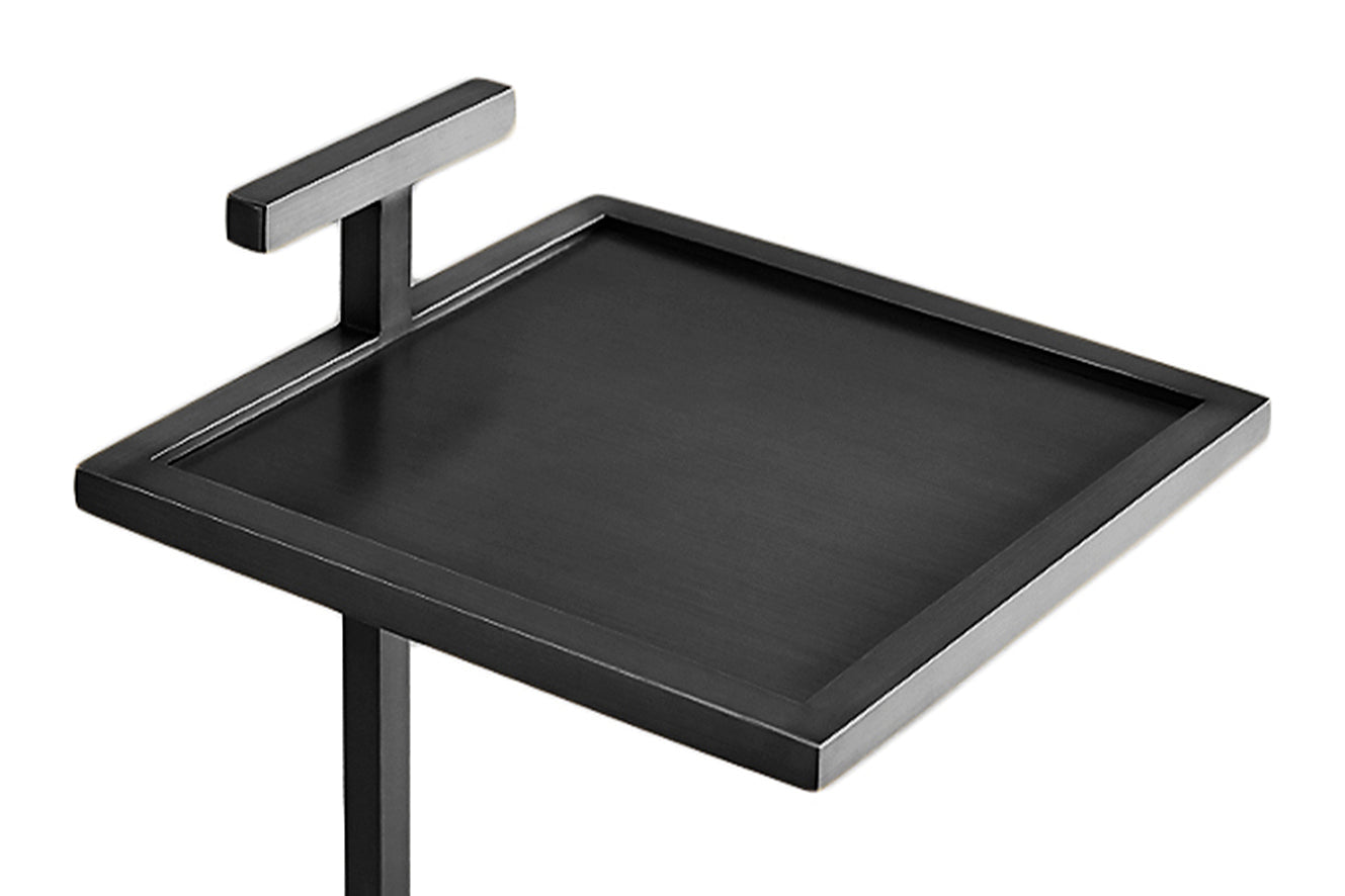 Black shower tray with chrome bracket on a white background