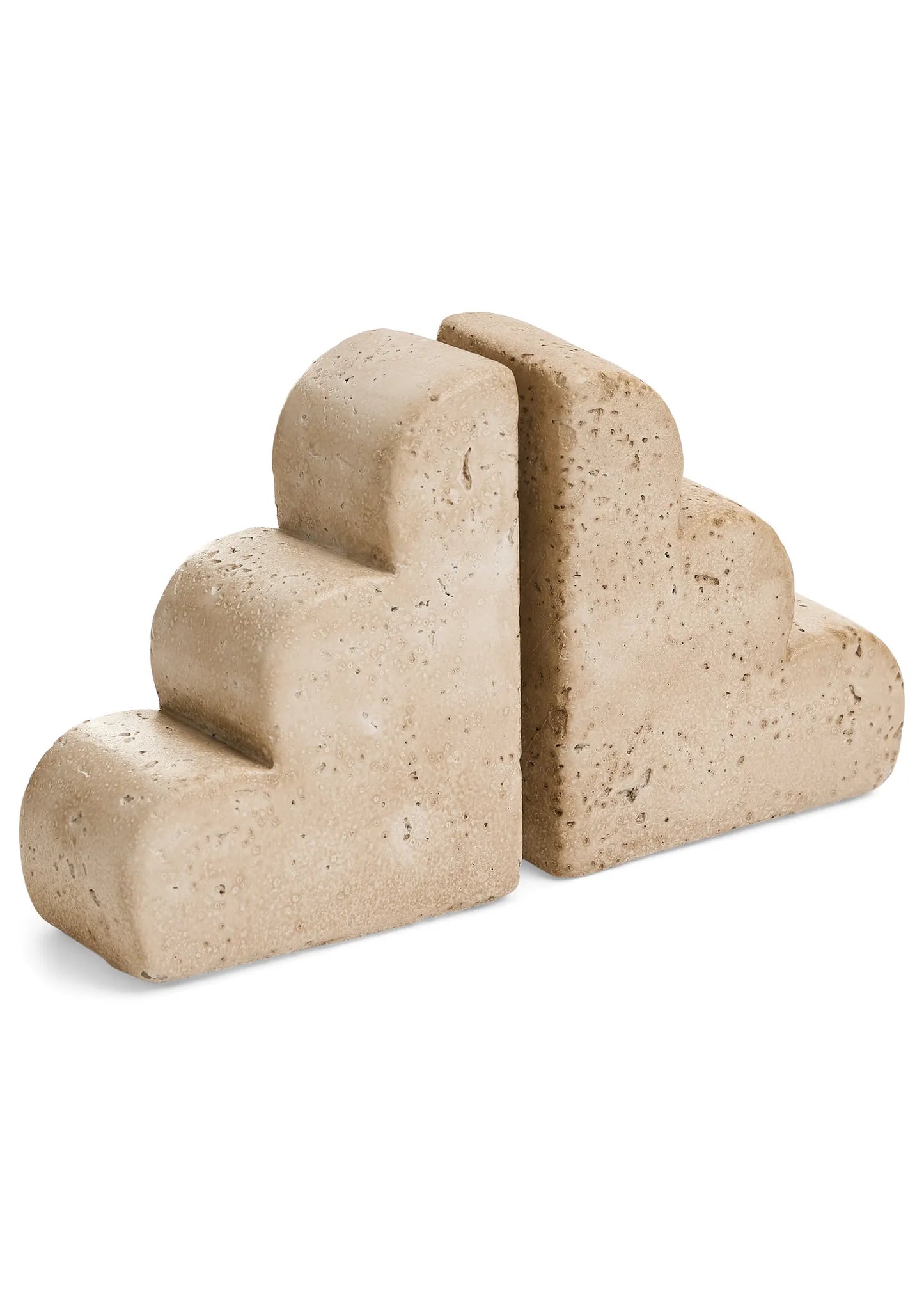 Beige stone bookends on a white background