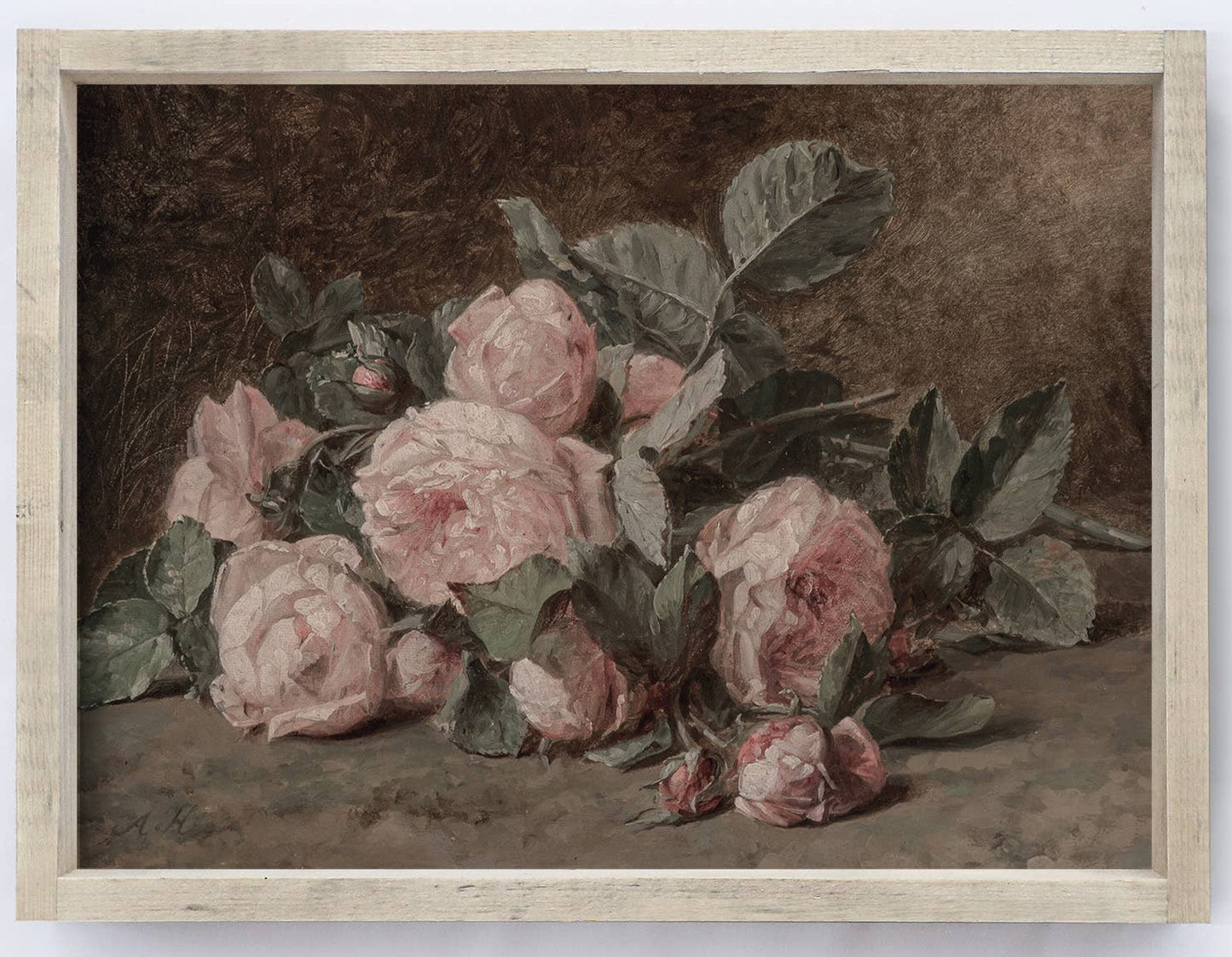 Framed artwork of pink roses on a white wall