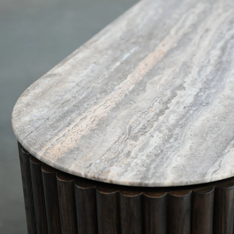 Marble-top table with metal base on a gray background