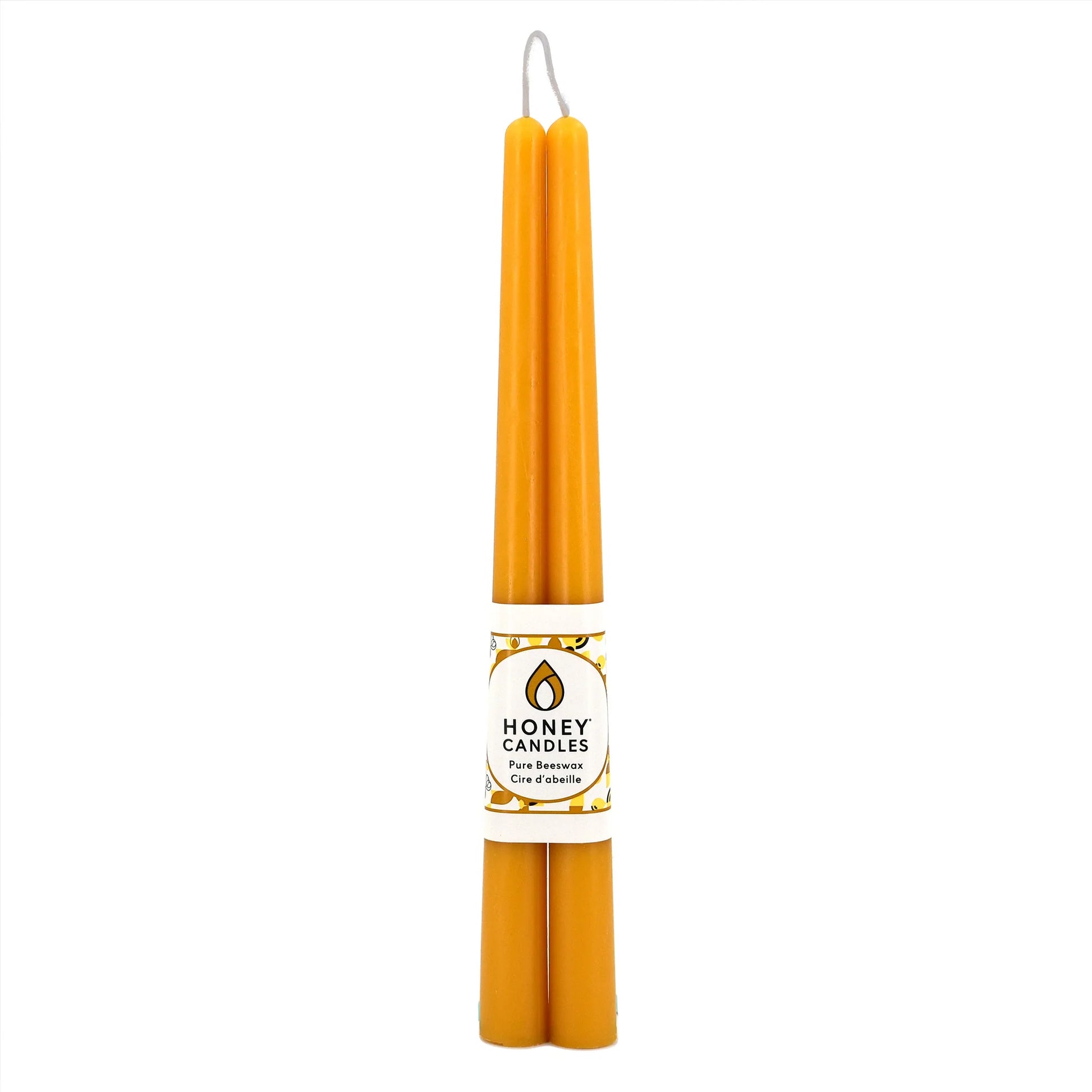 Two yellow candles with a 'Honey Candles' label on a white background