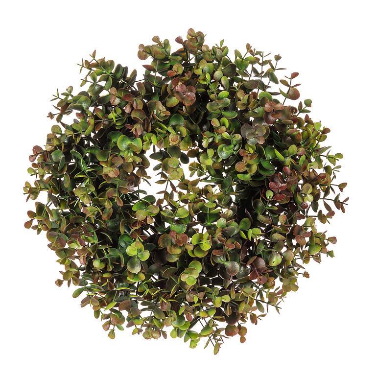 Artificial greenery wreath on a white background