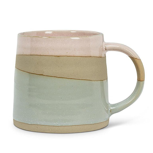 Ceramic mug with two-tone design on a white background
