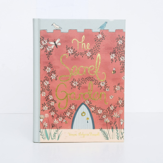 Book cover of 'The Secret Garden' with floral design and pink background