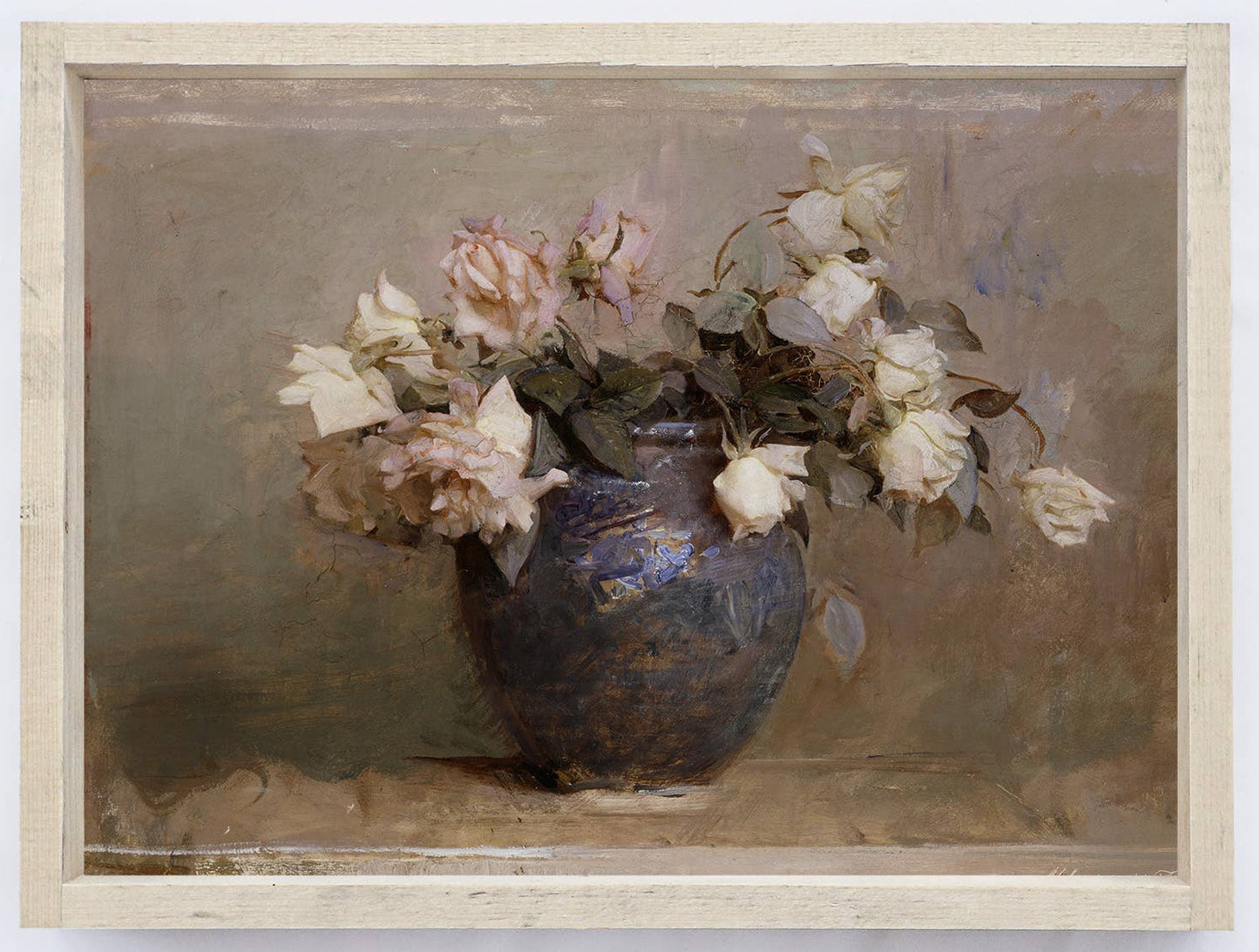 Framed painting of a vase with flowers on a white wall