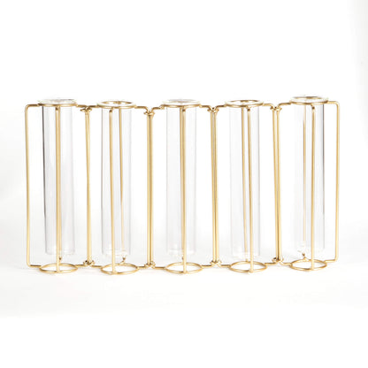 Gold metal and glass candle holder on a white background