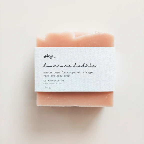 Bar of soap with a white label on a light background