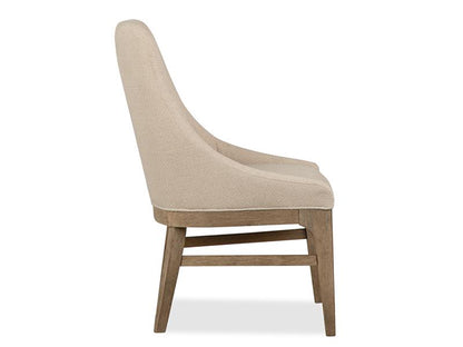 Beige upholstered chair with wooden legs on a white background