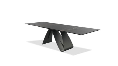 Modern black dining table on a white background