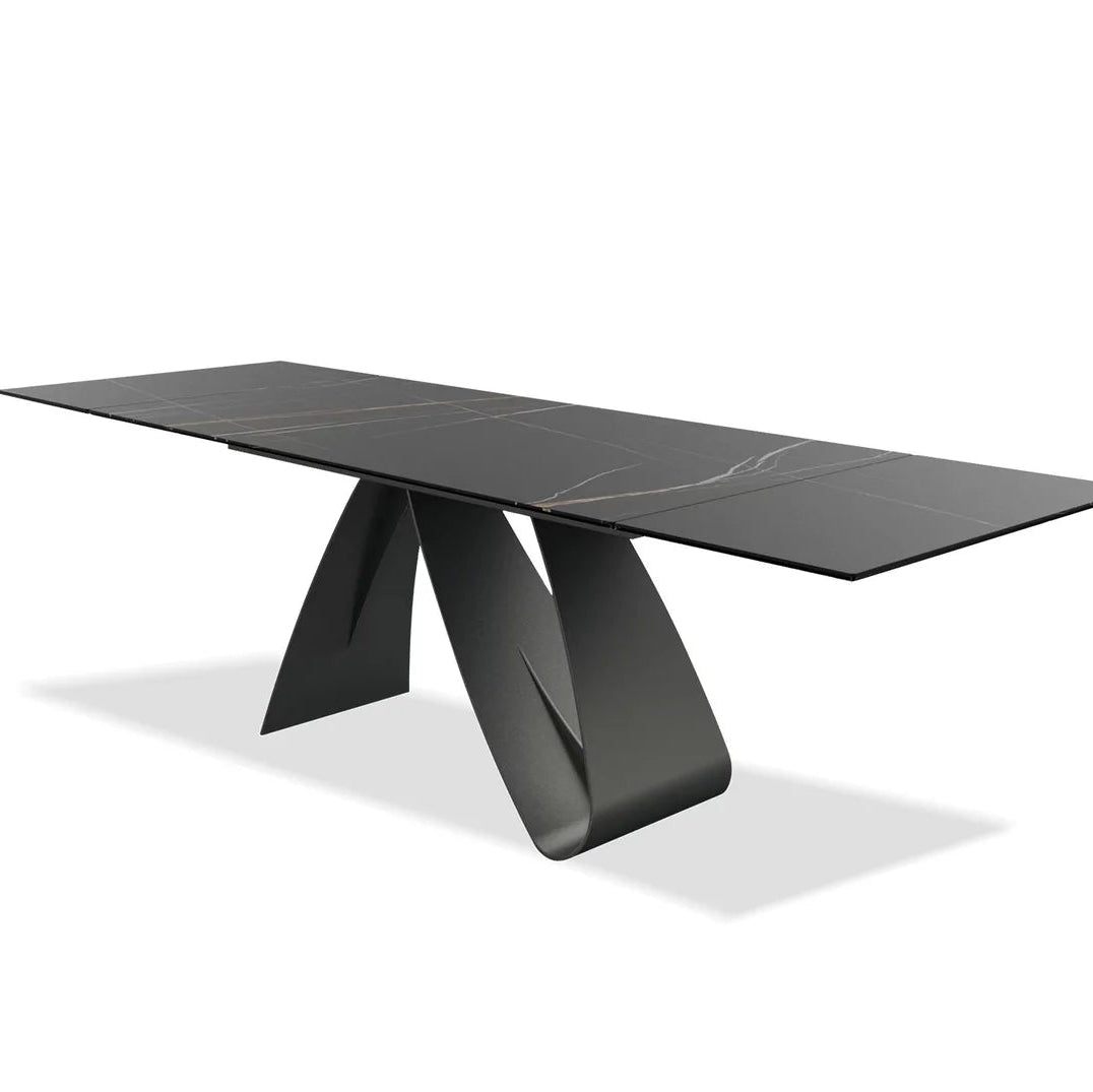 Modern black dining table on a white background