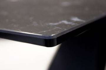 Close-up of a black surface with a textured finish
