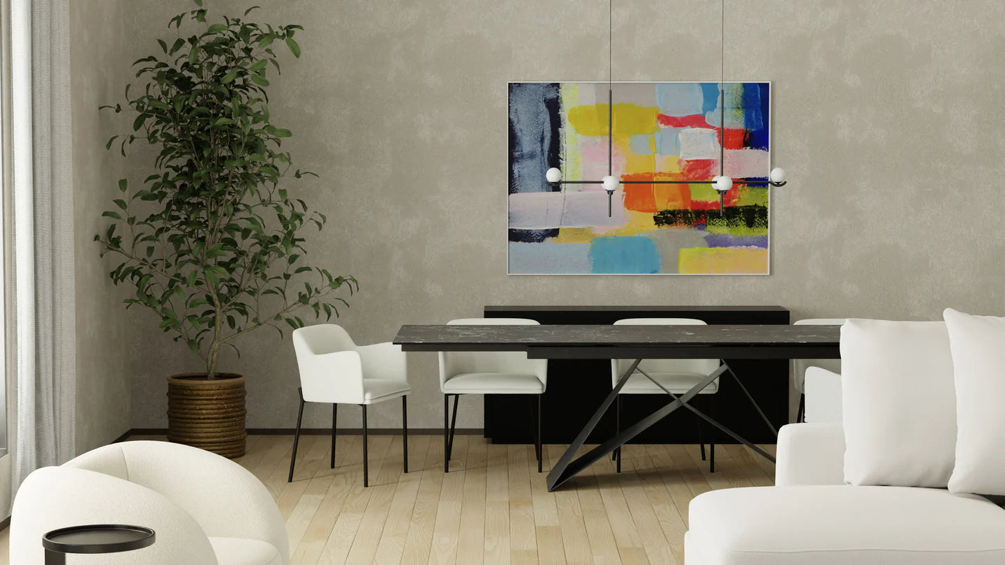 Modern living room with a dining table, chairs, and a colorful abstract painting on the wall.
