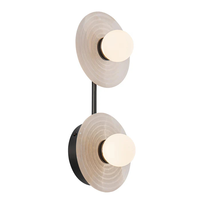 Modern wall light fixture with two circular shades on a white background