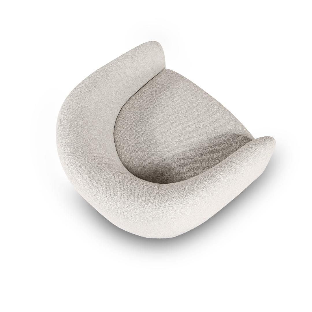 Curved beige pillow on a white background