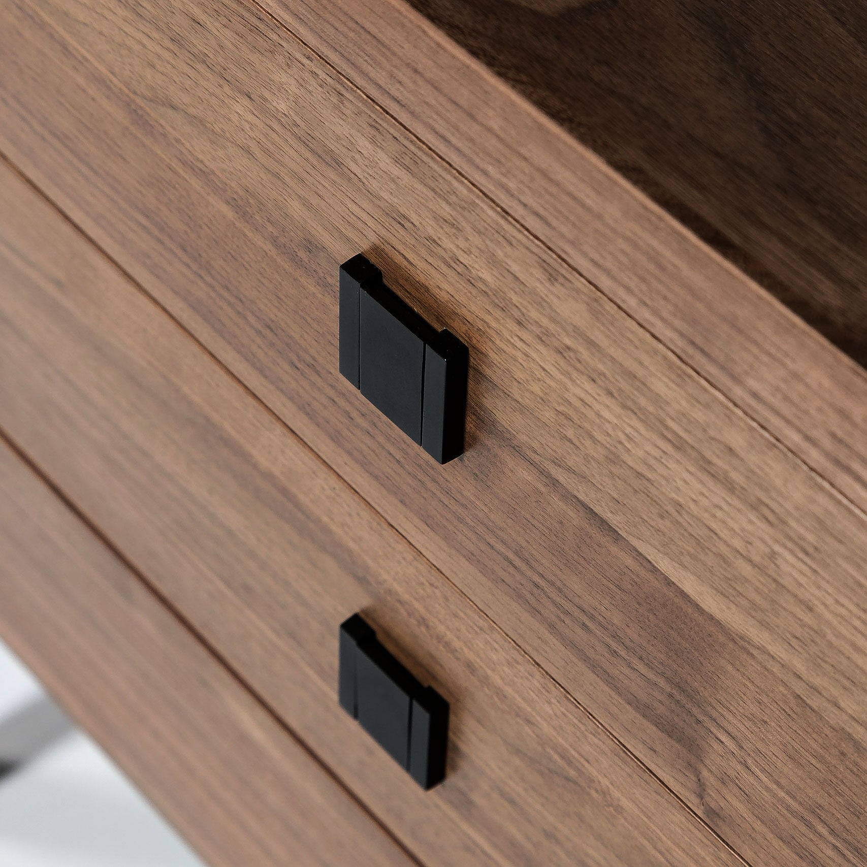 Wooden drawer with black handles
