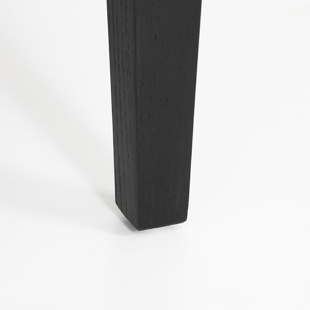 Black rectangular block on a white background