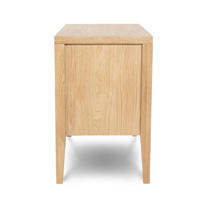 Wooden side table with a light finish on a white background