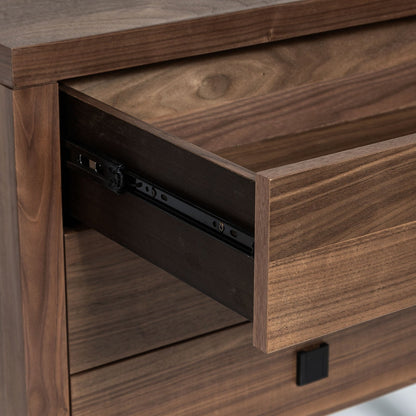 Wooden drawer with metal slide mechanism on a wooden cabinet.