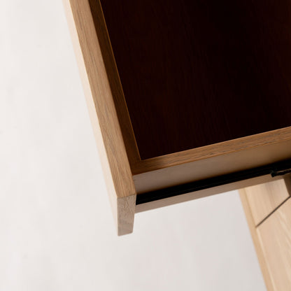 Wooden easel with a black board on a white background