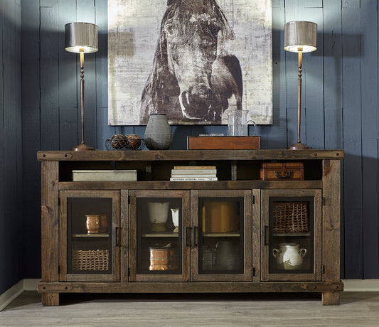 Wooden sideboard with glass doors against a dark wooden wall with a horse painting.