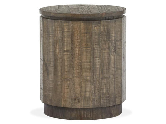 Wooden side table with a round top and cylindrical base on a white background