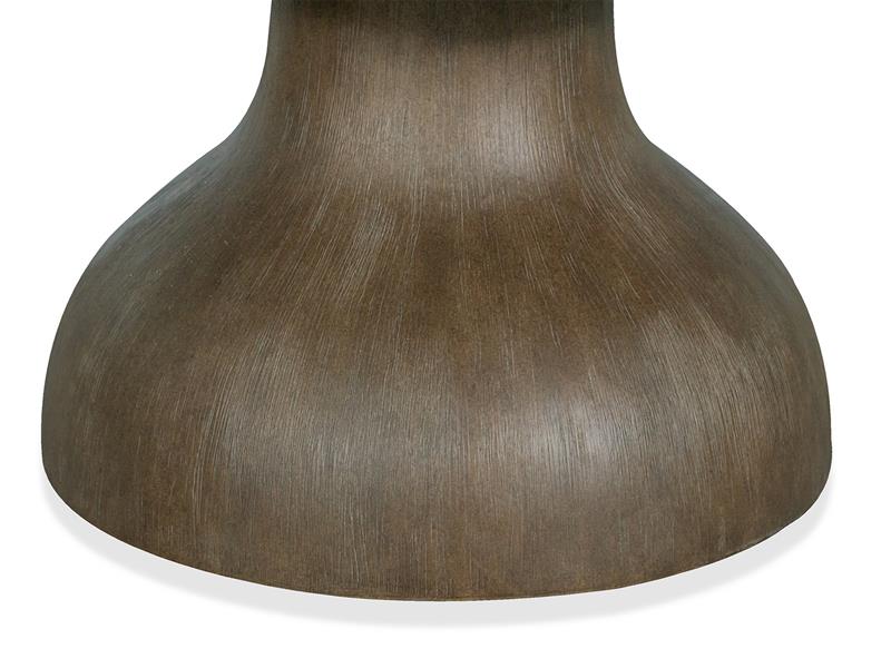 Close-up of a wooden table base on a white background