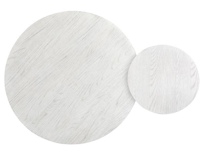 Two round white tables with textured patterns on a white background