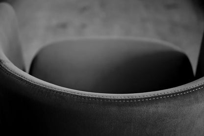 Close-up of a textured gray surface with a focus on the edge.