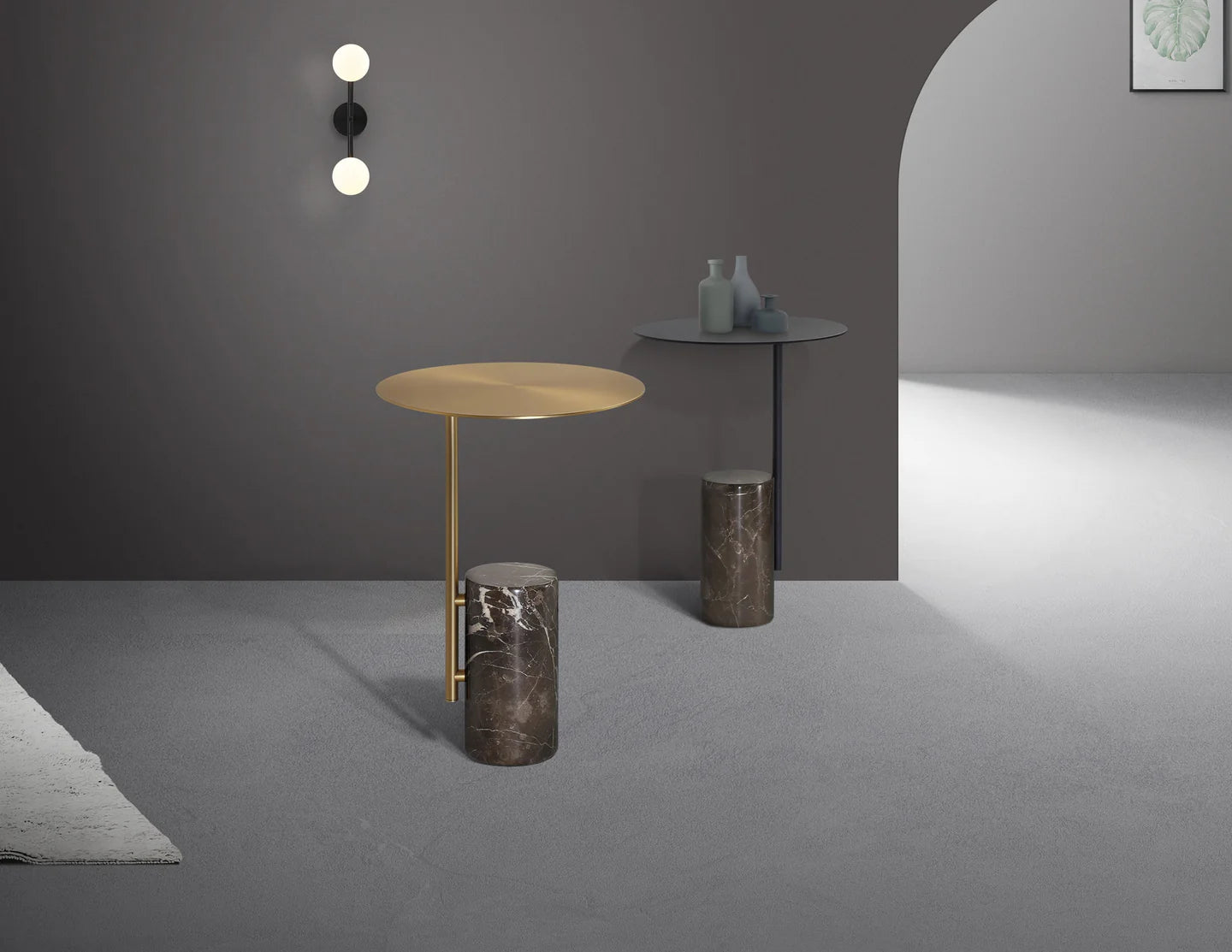 Modern interior with side tables and a wall sconce against a gray wall.