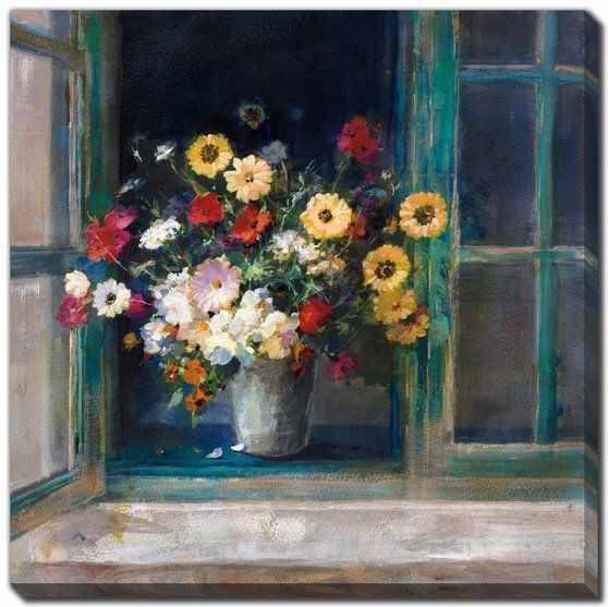 Bouquet of flowers in a vase on a windowsill with a dark background