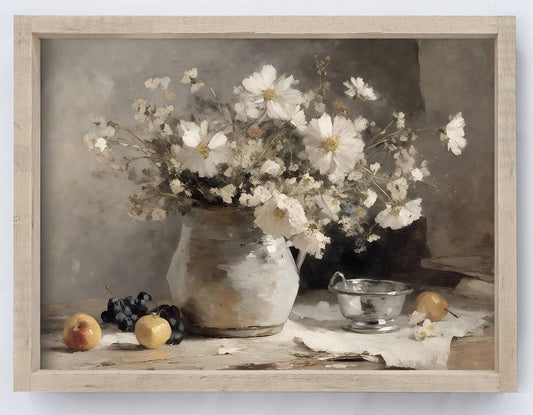 Framed artwork of a still life with flowers and fruits on a table.