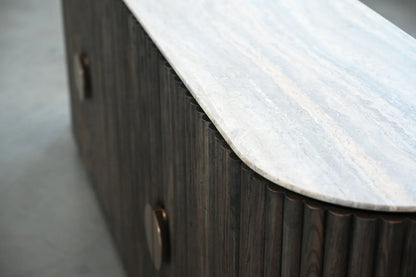 Wooden sideboard with marble countertop on a gray floor