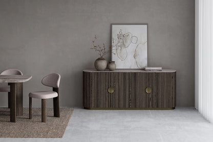 Modern interior with a wooden sideboard, table, and chairs against a gray wall.
