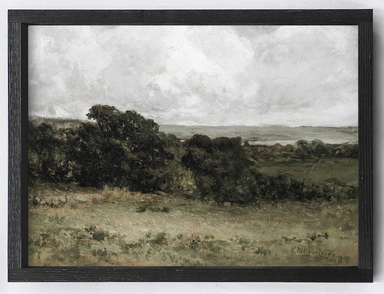 Framed landscape painting with trees and open field on a white background