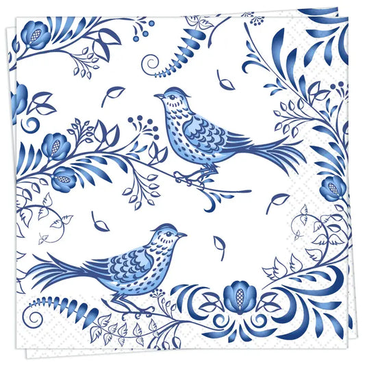 Napkin with blue floral and bird design on a white background