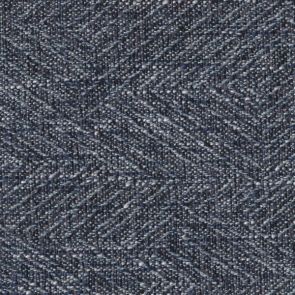 Close-up of a textured blue fabric with a herringbone pattern
